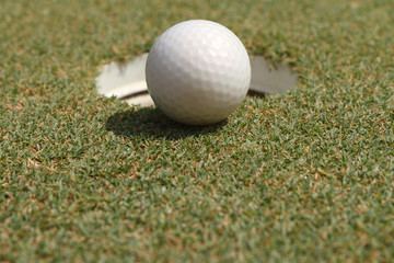 Golf ball on green