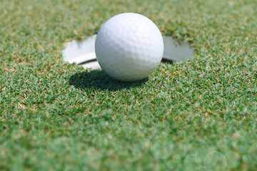 Golf ball on green