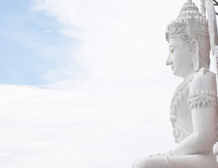 Graceful white statue of Buddha in Loei Province of Thailand