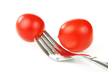 Cherry tomatoes on a fork