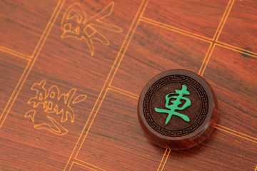 chessmen of chinese chess china in woodiness board