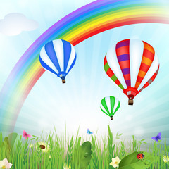 Paysage de printemps avec montgolfières et arc-en-ciel