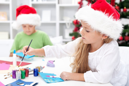 Kids making christmas greetings