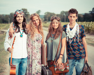 Hippie Group Walking on a Countryside Road