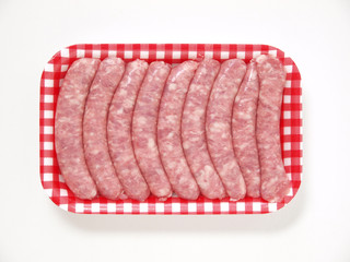 Fresh sausages on a tray 2