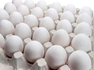 eggs of a hen in packing on a white background.