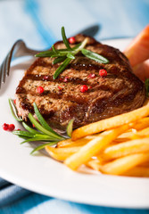 Grilled beef steak with french fries