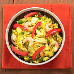 Rice dish with cabbage, chicken, shrimp, tomato, scallion