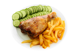 Roast chicken with french fries and cucumbers