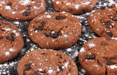 Chocolate chips cookies isolated on black