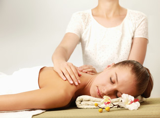Fototapeta na wymiar Closeup of an attractive young woman receiving massage