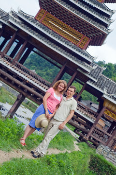 lovely couple. Beauty wearing, Old bridge architecture