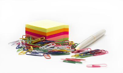 Adhesive note paper, with paperclips and pen