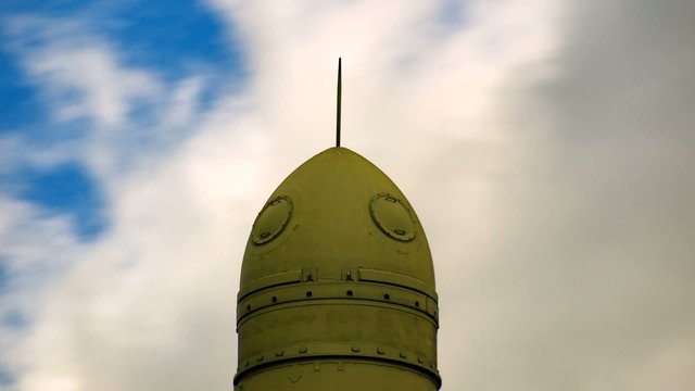 clouds over topol-m missile at military museum, timelapse