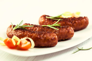 Grilled sausages on a plate