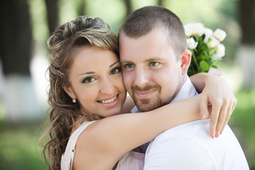 Fototapeta premium Portrait young happy couple in the city