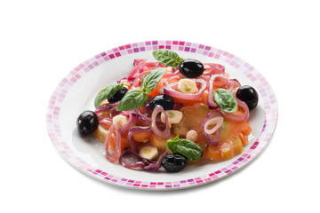 salad with ox heart tomatoes, onions olives and garlic