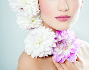 woman's face surrounded by flowers