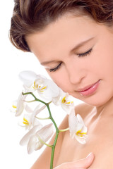 Obraz na płótnie Canvas woman with white orchid