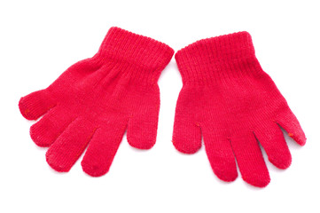 red knitted gloves in studio
