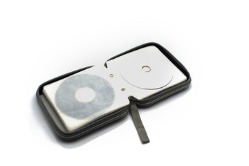Unzipped compact disk storage bag on white background © tusumaru