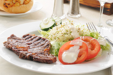 Steak and salad dinner
