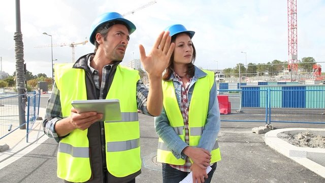 Construction people walking on construction site