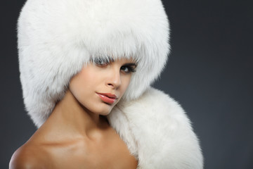 A photo of sexual beautiful girl is in fur clothes