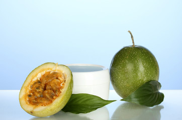 green passion fruit with cosmetical cream