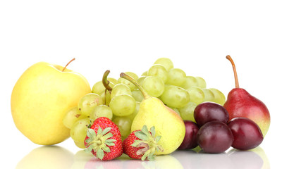 Mix of ripe sweet fruits and berries isolated on white