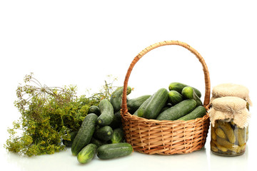 fresh cucumbers, pickles and dill in basket isolated on white