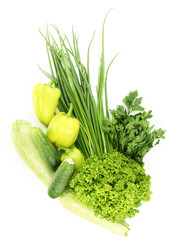 fresh green vegetables isolated on white