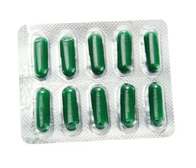 Capsules packed in blisters, isolated on white