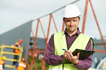builder site manager worker at construction site