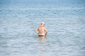 elderly  man in the sea