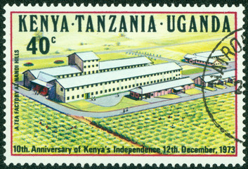 stamp printed in Kenya shows A Tea Factory at Nano Hill