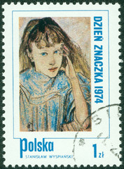 Stamp printed in Poland shows children's portrait