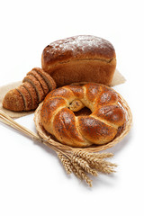 Fresh breads for a variety isolated on white.
