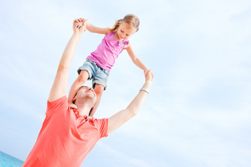 Happy father and daughter