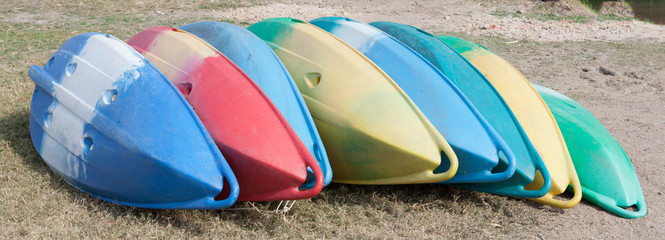 Colorful boat upside down on the shore
