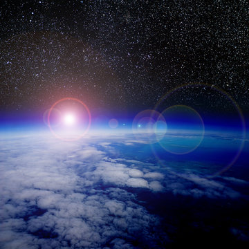 Fototapeta Sunrise over planet Earth.