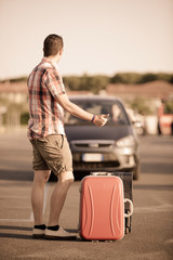 Young Man Hitchhiking