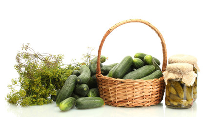fresh cucumbers, pickles and dill in basket isolated on white