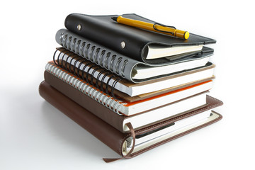 stack of ring binder book or notebook