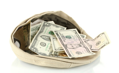 cap with money on a white background