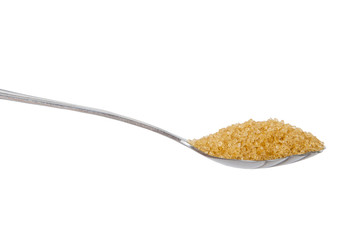 Cane sugar on the spoon isolated on white background