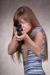 cute girl with gun