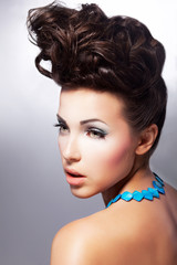 Glamour beautiful woman model with amazing makeup and hairstyle