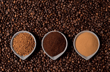 Three types of coffee on coffee beans