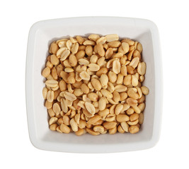 Nuts in a dish isolated on white